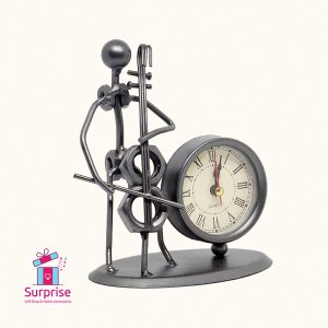 ⁦ديكور معدن على شكل عازف موسيقى مع ساعة⁩ - الصورة ⁦2⁩