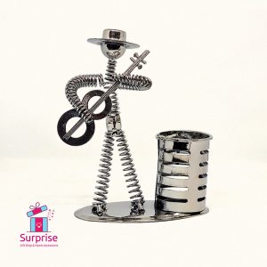 ⁦مقلمة معدن على شكل شخصية موسيقية⁩ - الصورة ⁦2⁩