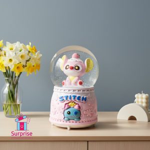 ⁦كرة ثلج مائية ذاتية الحركة ستيتش مضيئة وموسيقية⁩ - الصورة ⁦1⁩