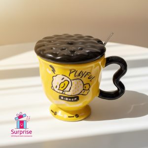 ⁦مج بورسلين بغطاء ومعلقة معدنية⁩ - الصورة ⁦1⁩