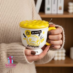 ⁦مج بورسلين بغطاء ومعلقة معدنية⁩ - الصورة ⁦1⁩