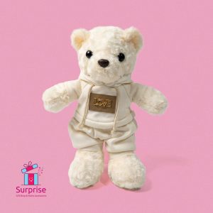 ⁦دبدوب فرو مرتدي هودي وشورت أنيق 33 سم⁩ - الصورة ⁦2⁩