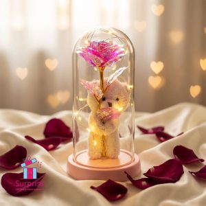 Lighted Glass Crystal Featuring an Artificial Flower & Teddy Bear Figurine - Image 1