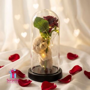 Lighted Glass Crystal Featuring an Artificial Flower & Teddy Bear Figurine - Image 1