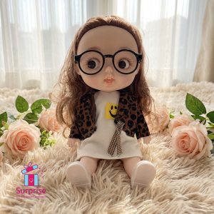 Articulated Doll with Glasses – Plays One Song - Image 1