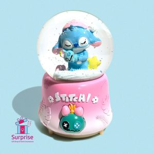 ⁦كرة ثلج ووتر بول موسيقية ديزني بشخصية ستيتش وأنجل مع أضواء LED ملوّنة⁩ - الصورة ⁦2⁩