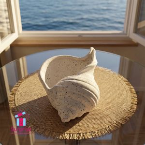 ⁦وعاء على شكل صدفة من البورسلين⁩ - الصورة ⁦1⁩
